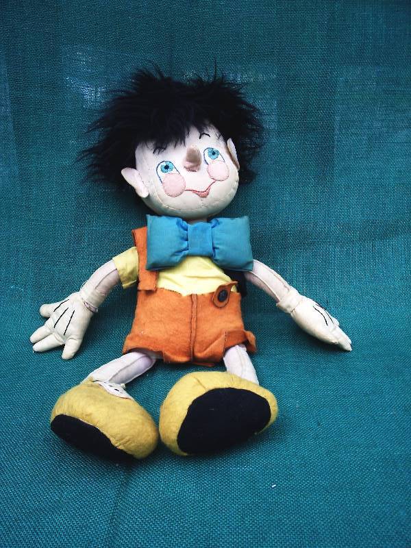 lot 24 image: Antique Cloth Pinocchio