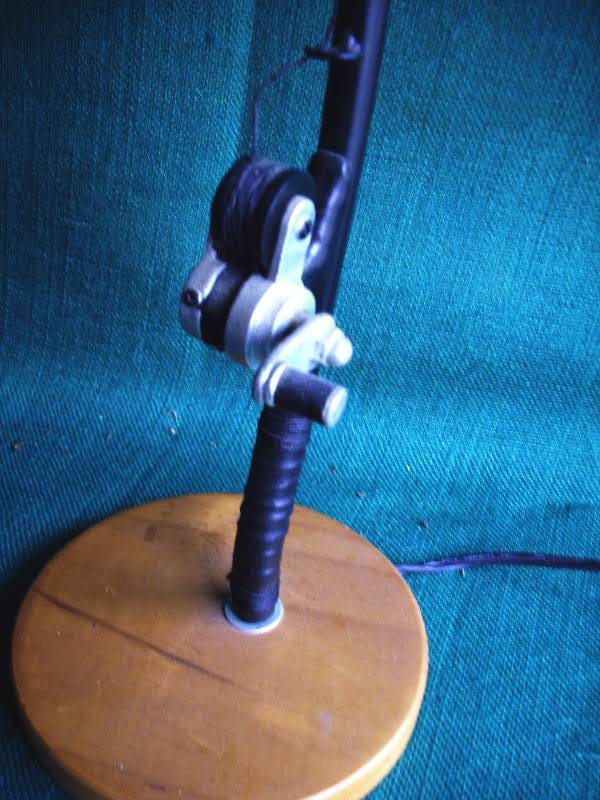 lot 64 image: Fishing Hat and Reel Lamp.