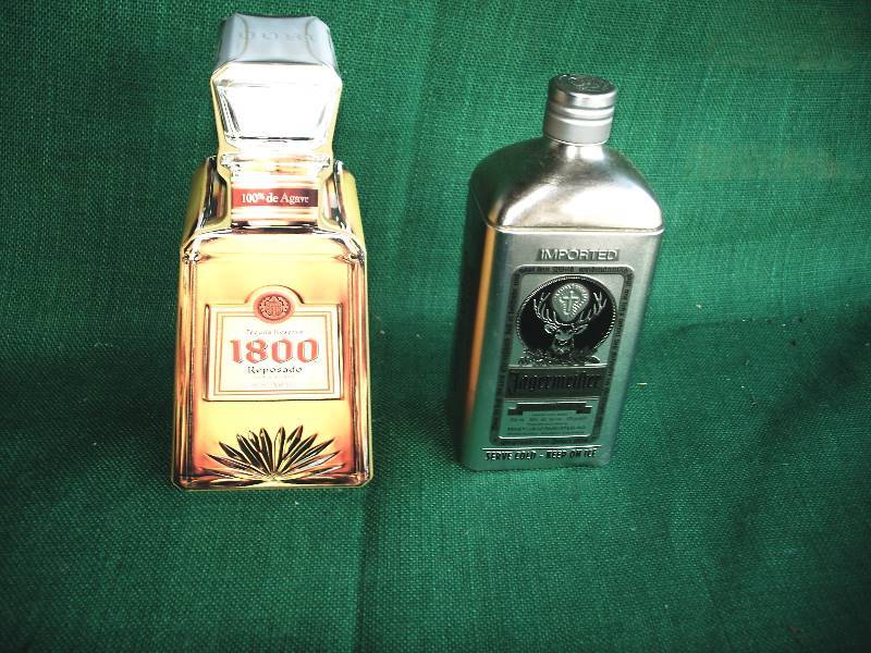 lot 68 image: Jgermeister and Tequila Reserve 1800 Tin Containers.