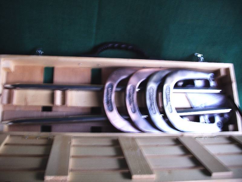 lot 110 image: NEW Horse shoe stakes and shoes set.