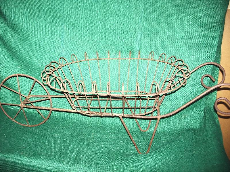 lot 111 image: Vintage wire wheel barrel