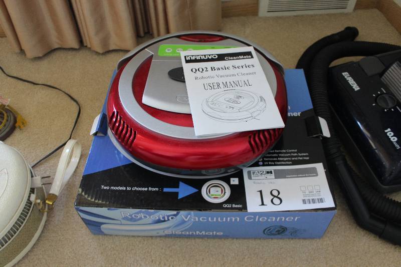 lot 18 image: Infinuvo CleanMate Robotic Vacuum Cleaner w User Manual