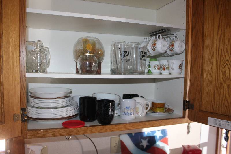 lot 29 image: Cupboard Lot of Housewares Includes Coffee Cups, Glasses, Plates