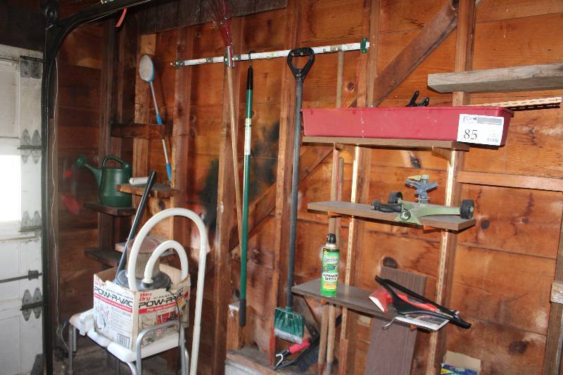 lot 85 image: Wall Lot Includes Yard Tools, Cleaning Tools, WetDry Power Vac