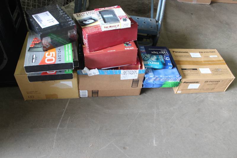 lot 41 image: VHS Tapes, VHS Labels, MDV Tapes, CD Cases, Panasonic 12V AC Adapter Power Supply Model AW-PS510AN, Teac Thermal Disc Printer, Time Master II Time Calculator