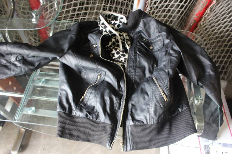 lot 136 image: Beverly Hills Polo Club Jacket
