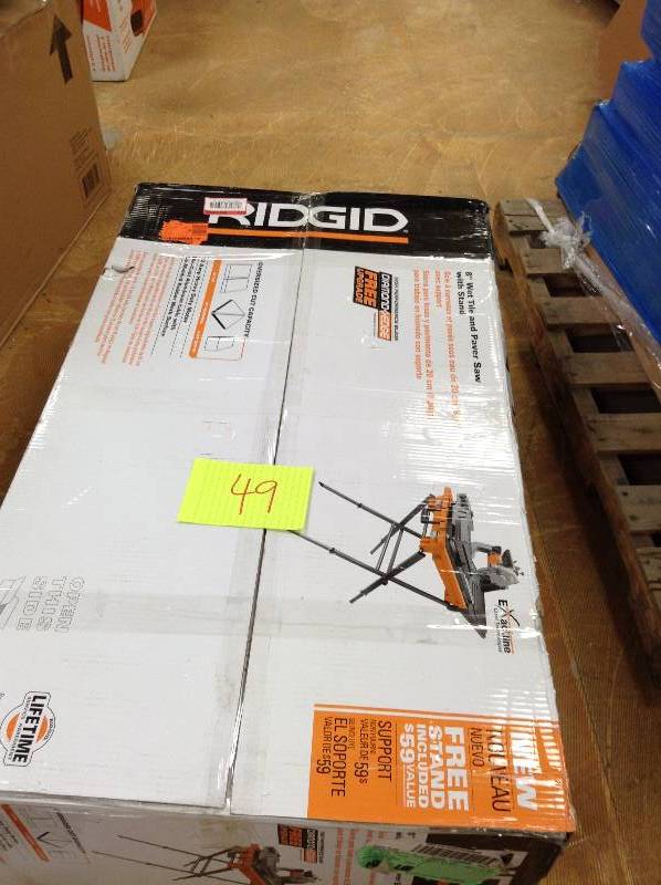lot 49 image: RIDGID 8 in. Tile Saw with Stand Model # R4040S in like new working conditions
