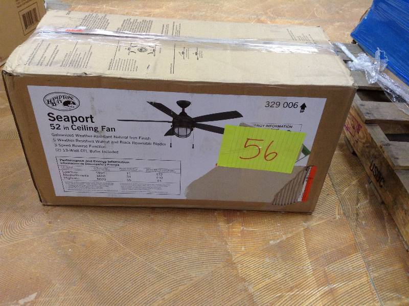 lot 56 image: Hampton Bay Seaport 52 in. IndoorOutdoor Natural Iron Ceiling Fan Model#  AL634-NI  open box never used