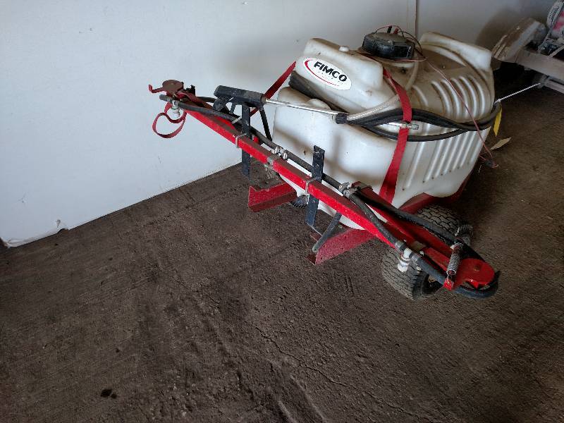 lot 16 image: Fimco 7 Wide Pull Behind 12 Volt S...