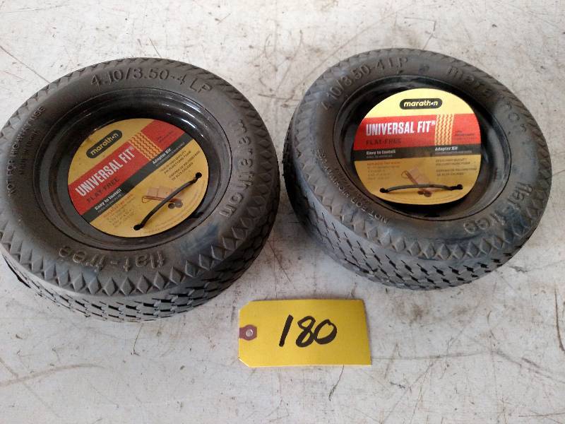 lot 180 image: (4) 4.103.50-4LP Flat Free Tires o...