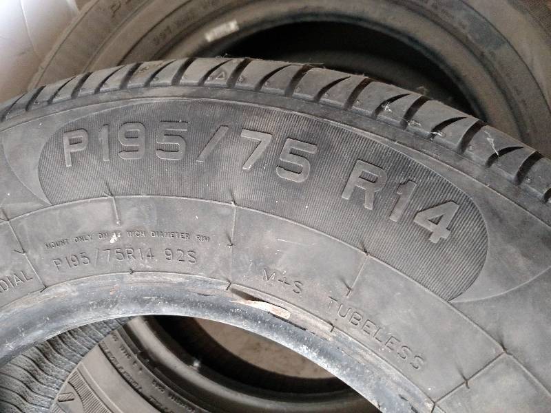lot 185 image: (3) Tires, 1 each 14, 15, & 16...