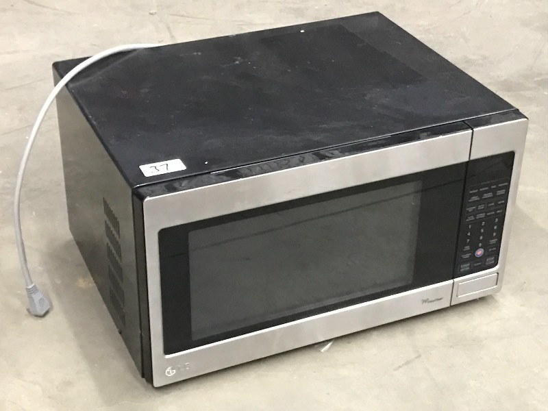 lot 37 image: Unused LG Easy-Clean Microwave Oven...
