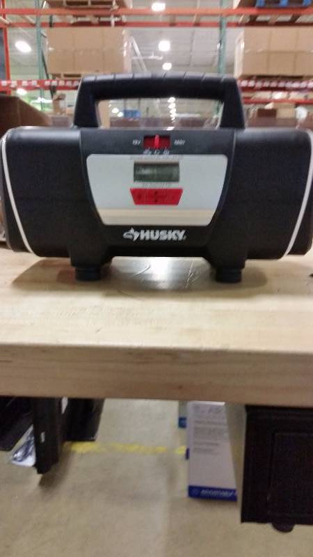 lot 68 image: Husky 12 volt120 volt home and auto inflator