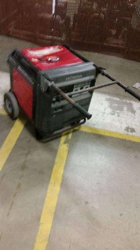 lot 88 image: Honda eu6500is gas powered generator