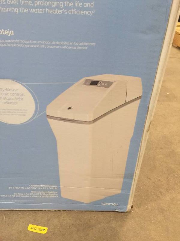 lot 5 image: GE 30,000 Grain Water Softener Model # GXSF30V small damage on the plastic cover no used