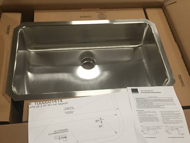 lot 10 image: Elkay Gourmet Lustertone Undermount Stainless Steel 30-12 in. Single Bowl Kitchen no used  30-12 in. L x 18-12 in. W x 7-12 in. D Model # ELUH2816PDK