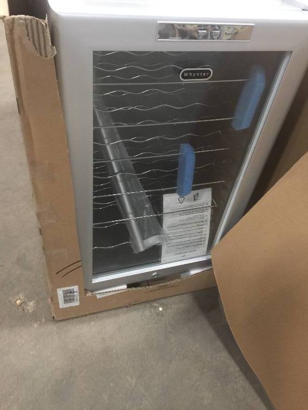 lot 13 image: Whynter 28-Bottle Thermoelectric Wine Cooler Model#  WC-28S  not used