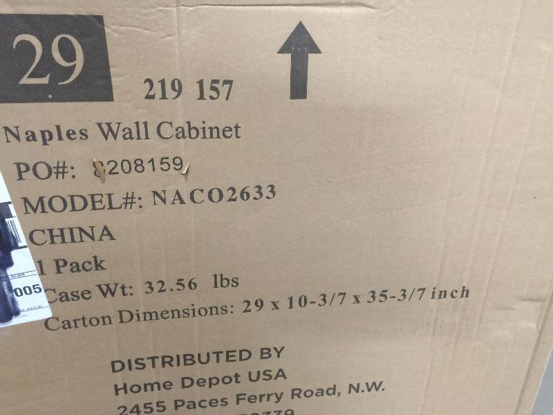 lot 20 image: Foremost Naples 26-12 in. W x 32-34 in. H x 8 in. D Bathroom Storage Wall Cabinet in Warm Cinnamon Model # NACO2633 no used