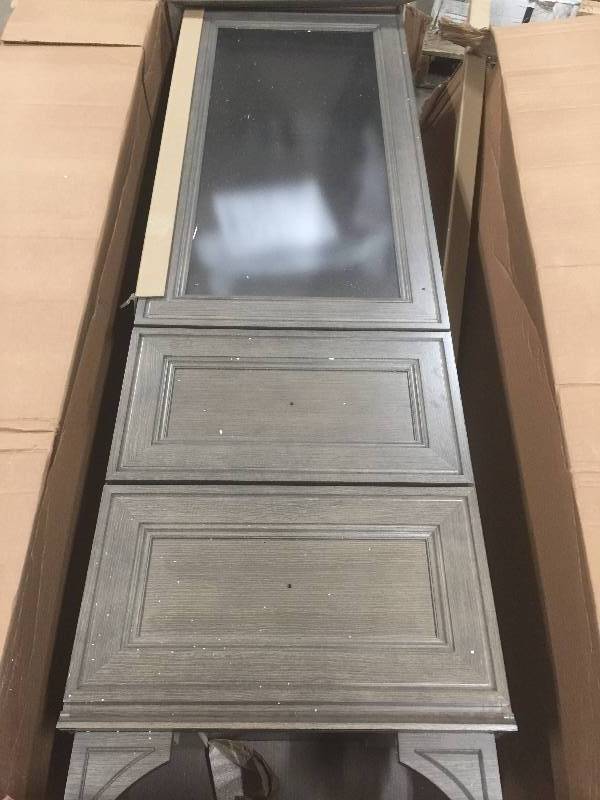 lot 24 image: Home Decorators Collection Albright 21 in. W Linen Storage Cabinet in Winter Gray, Model#  19FLC2168  open box  small damage on the top 23.5 in. W and 16.3 in. D provide ample storage, 70.3 in. H with crown molding accent