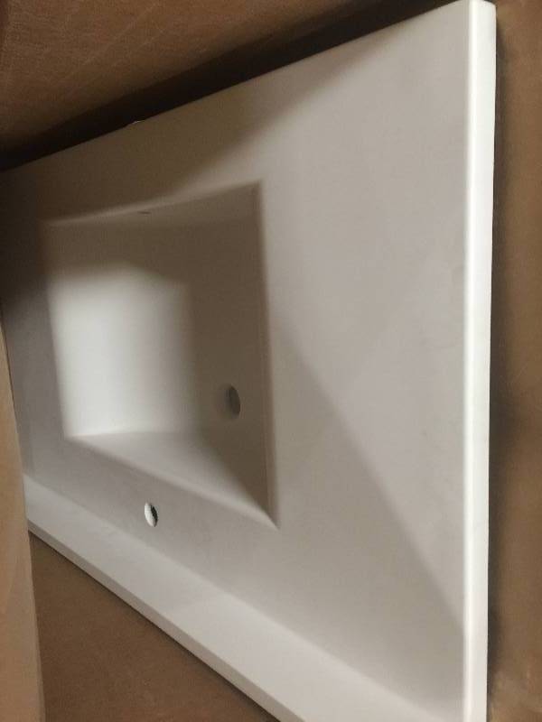 lot 26 image: Swan Contour 37 in. W x 22 in. D x 10-14 in. H Solid-Surface Vanity Top in White with White Basin Model # CV2237-010 not used