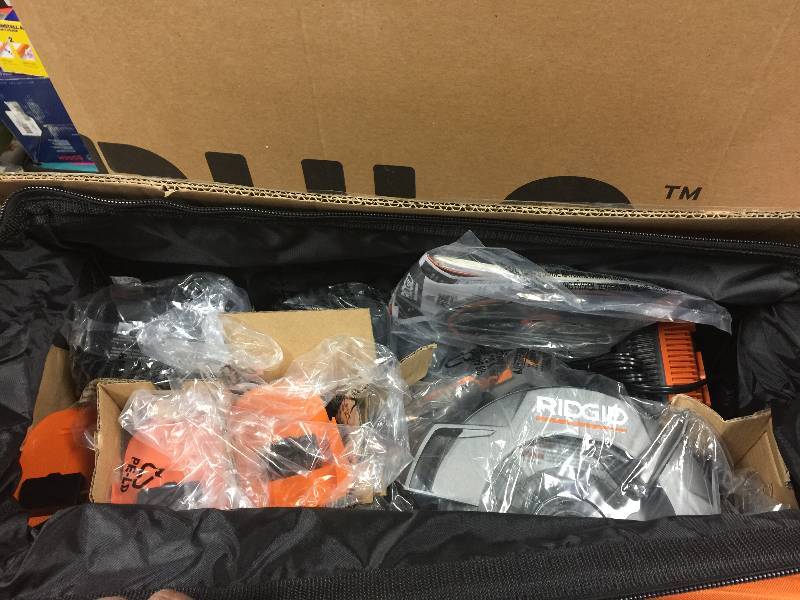 lot 57 image: RIDGID 18-Volt Cordless Combo Kit (5-Piece) Model # R9623N open box never used