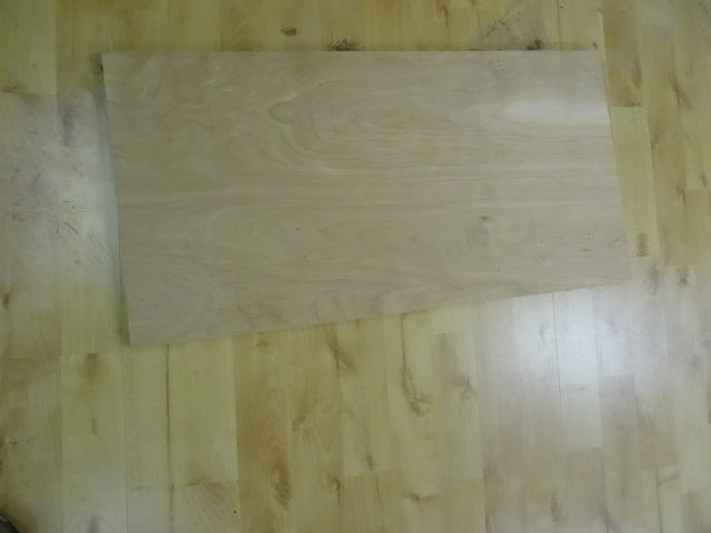 Pile of wood. Mostly laminate shelv...