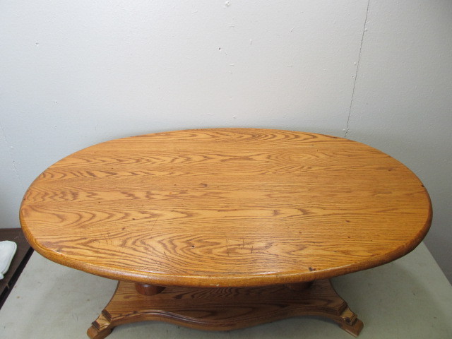 lot 82 image: Solid Oak Oval Coffee Table
