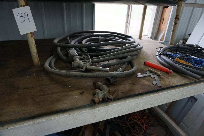 lot 39 image: Fuel Storage Tank With Hose and Nozzle