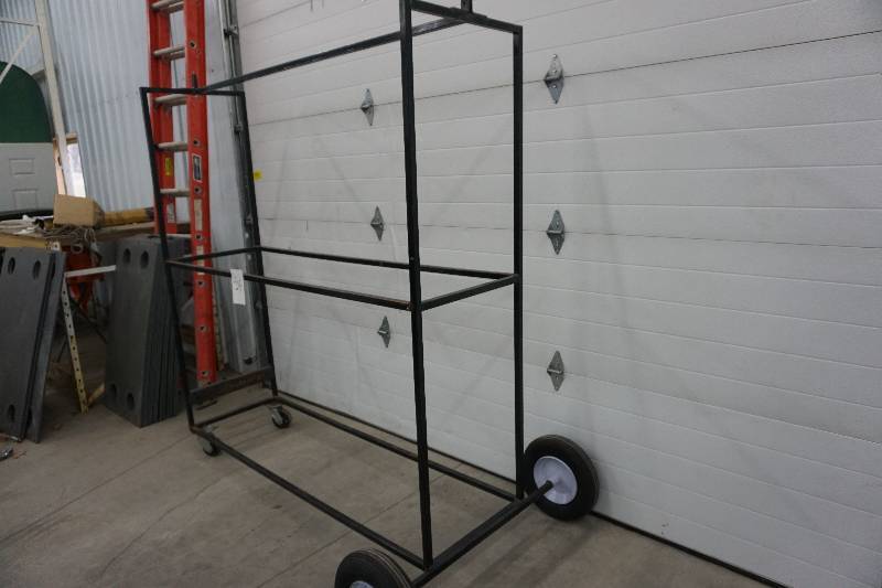 lot 54 image: Wheeled Metal Tire StorageDisplay Rack