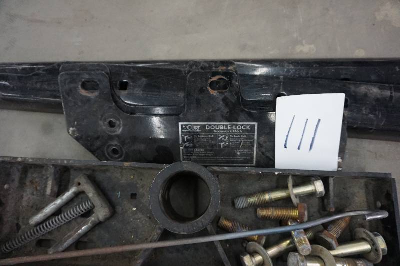 lot 111 image: Curt Brand Double Lock Truck Bed Goose Neck Hitch