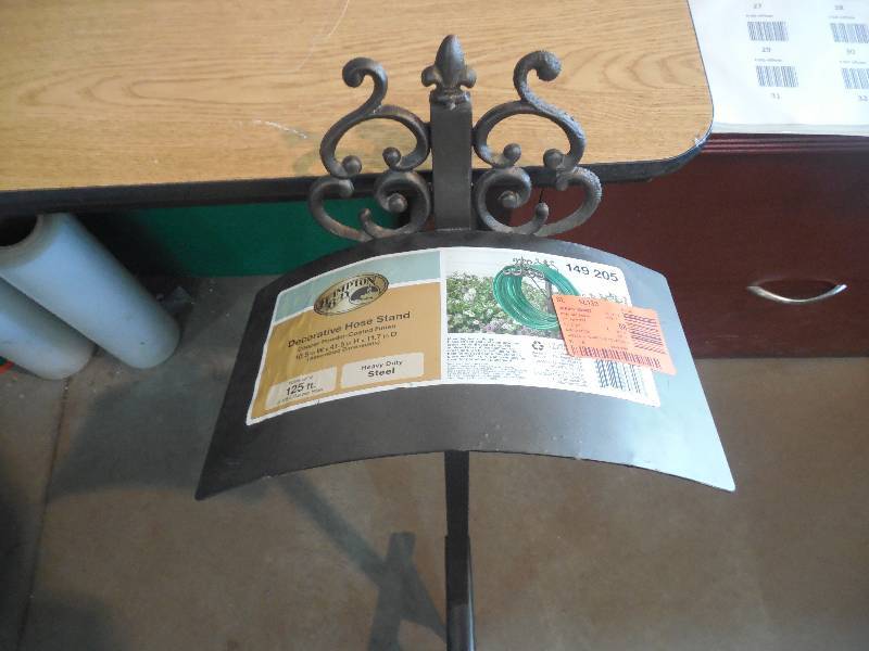 lot 32 image: Hampton Bay Decorative Hose Stand