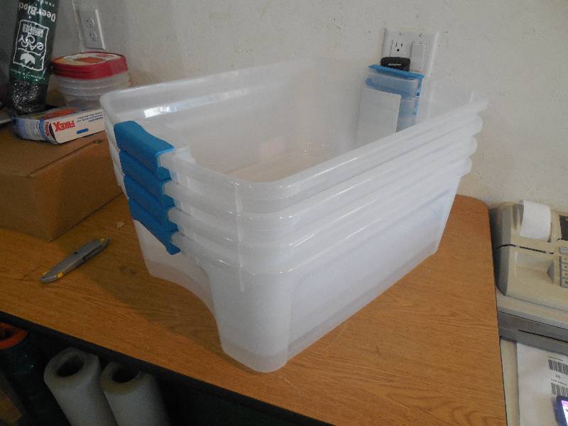lot 38 image: (4) 12 GALLON STORAGE TOTE