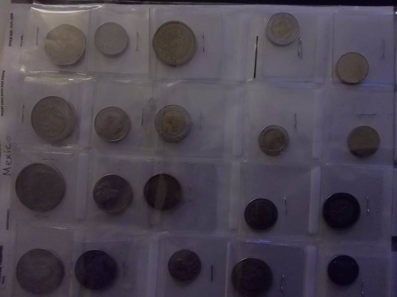 Page Lot Full Of 20 Mexican Coins