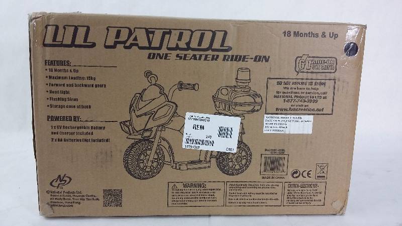 lot 2056 image: Kid Motorz 6V Lil Patrol Motorcycle Ride-On - Black  White 