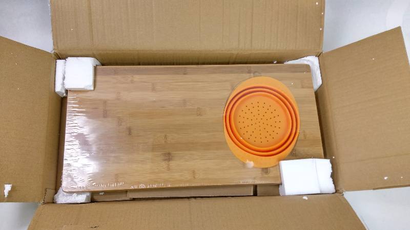 lot 1847 image: Alcove over the sink cutting Board - Orange