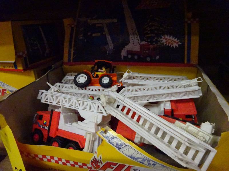 18 fire engines, typewriter puzzles, 5 highway haulers, hand shake blaster balls, balls