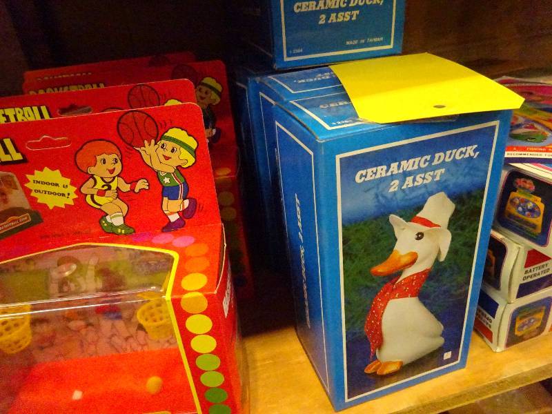 ceramic ducks, basketballs, fishing mugs, candles, pens, pogs