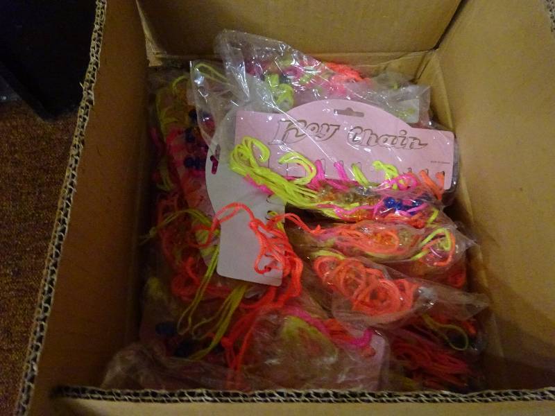Huge lot.  Pacifier necklaces, gold baby things, charms, iron-ons
