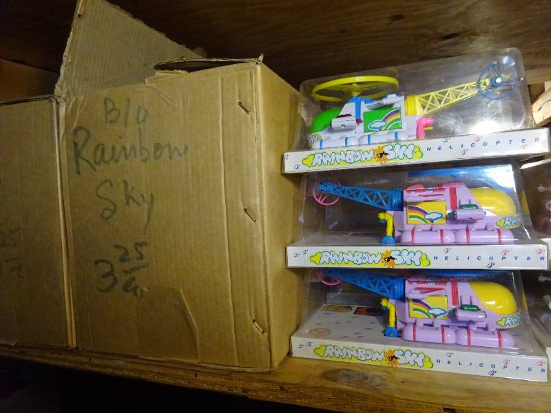 2 Cases Rainbow Helicopters, Case 560 SEL, Case Ninja Tricycle, 3 Cases Corvettes, Case Musical Caterpillar, Battery Operated Mobiles