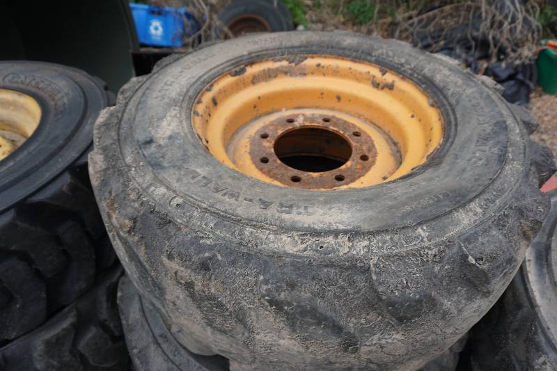 lot 9 image: Set of - 4 Extra Wall Brand Skid Loader Tires and Rims