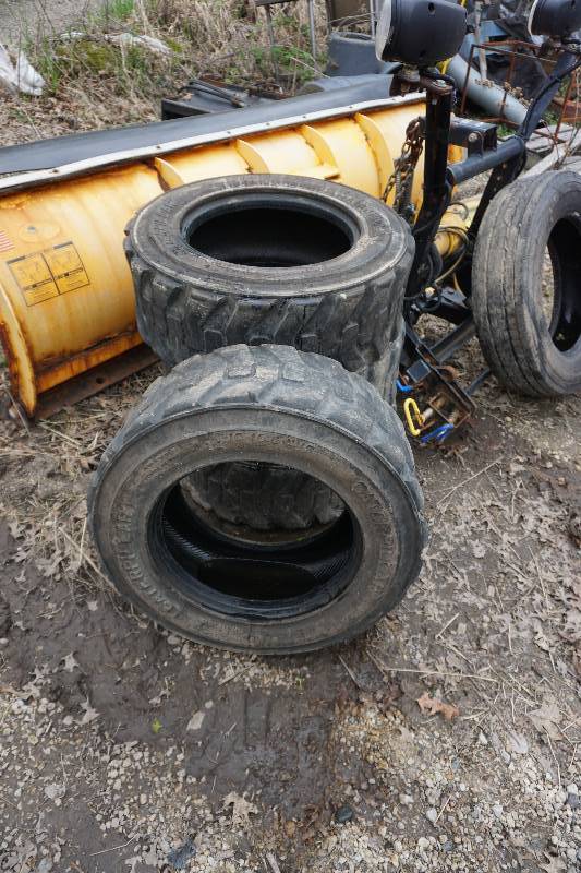 lot 11 image: Set of 4 - Caterpillar Brand Skid Loader Skid Steer Tires