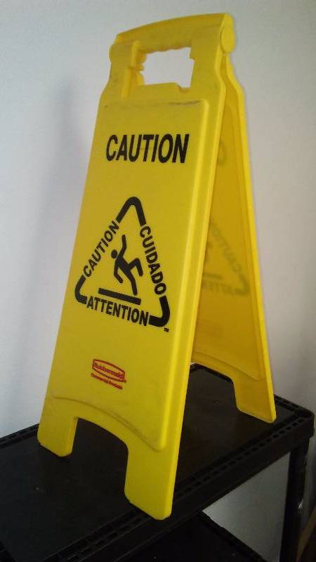 Caution Slippery Floor Sign