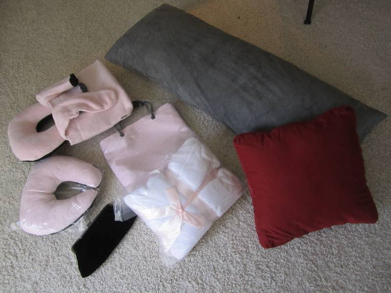 lot 9 image: Mary Kay lot of socks, neck pillow,...
