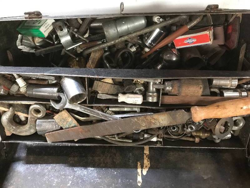 Tool box full of tools, parts, hardware