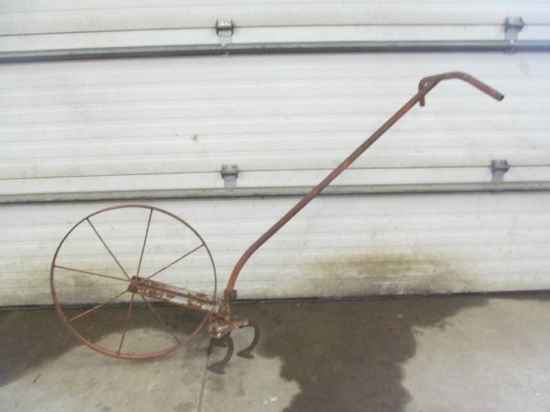 lot 48 image: Antique tiller
