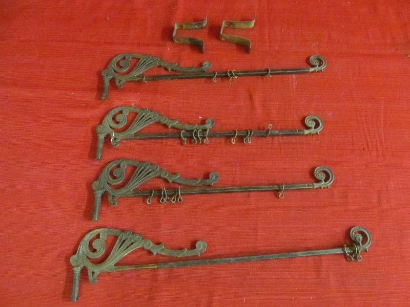 lot 54 image: vintage cast-iron plant hangers