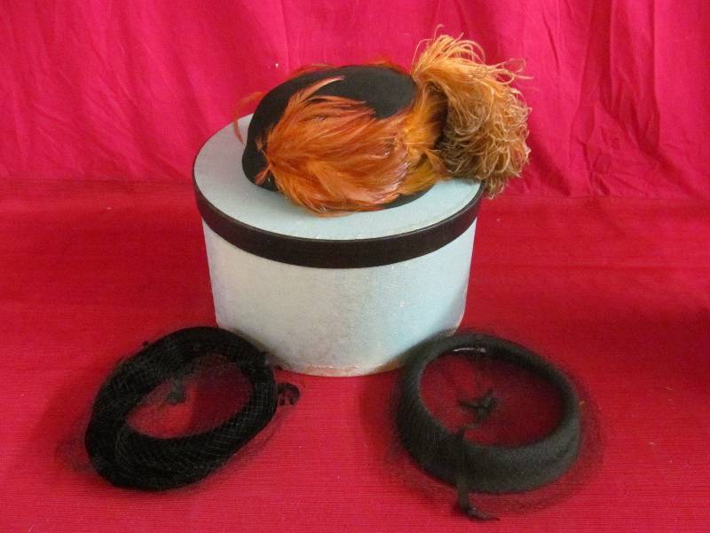 lot 108 image: vintage hat box ,3 hats