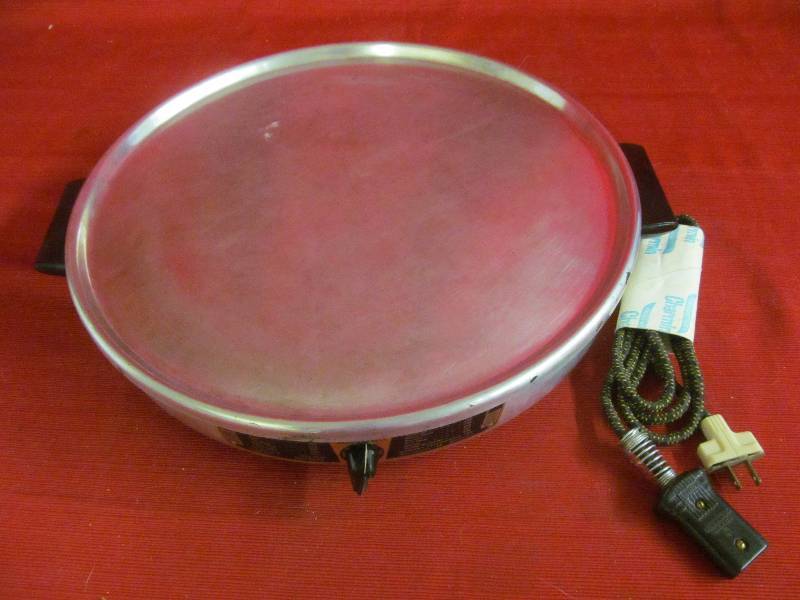 lot 135 image: Bethany fellowship lefse grill