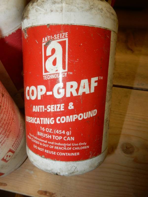 lot 92 image: 11 bottles of Cop Graf Anti Seize and Lubricating Compound
