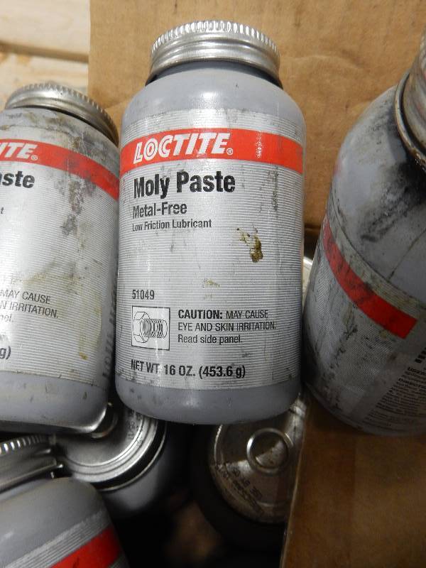 lot 91 image: 7 containers of Moly Paste